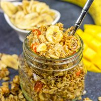 This Tropical Granola is packed with dried fruit, oats and nuts. Add a spoonful to a bowl of yogurt for breakfast or just it plain as a mid-afternoon snack!