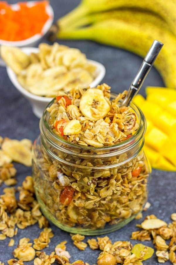 This Tropical Granola is packed with dried fruit, oats and nuts. Add a spoonful to a bowl of yogurt for breakfast or just it plain as a mid-afternoon snack!