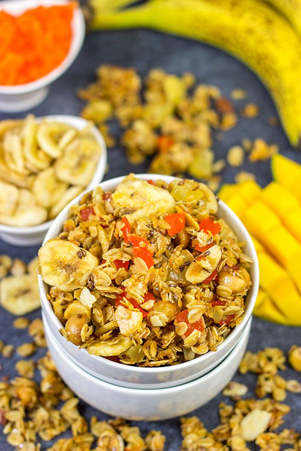 This Tropical Granola is packed with dried fruit, oats and nuts. Add a spoonful to a bowl of yogurt for breakfast or just it plain as a mid-afternoon snack!
