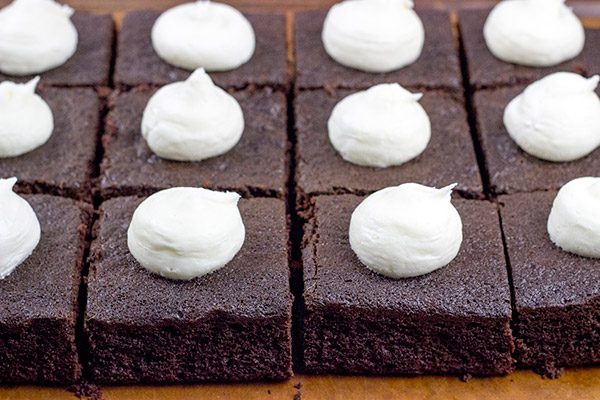 These Chocolate Marshmallow Radio Bars feature a chocolate cake base topped with a scoop of marshmallow buttercream...oh yeah, and then they're covered in a chocolate glaze!