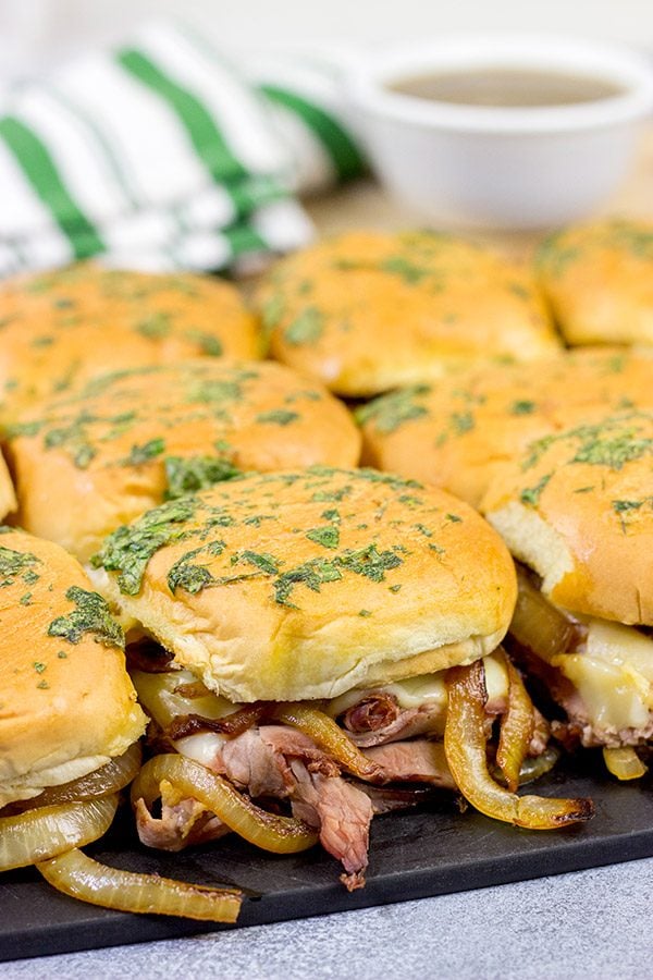 These French Dip Sliders use deli-sliced roast beef for a shortcut version of the classic.  The caramelized onions and au jus sauce are required, though!