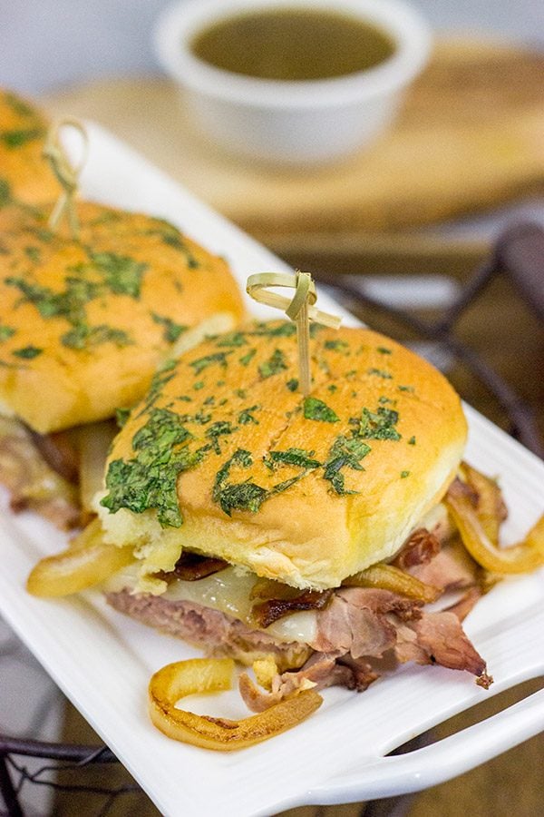 These French Dip Sliders use deli-sliced roast beef for a shortcut version of the classic.  The caramelized onions and au jus sauce are required, though!