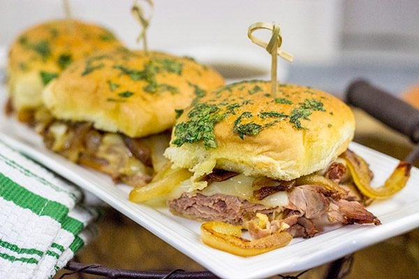 These French Dip Sliders use deli-sliced roast beef for a shortcut version of the classic.  The caramelized onions and au jus sauce are required, though!
