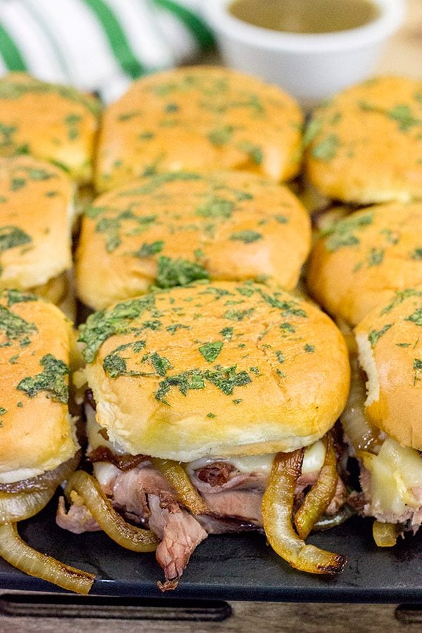 These French Dip Sliders use deli-sliced roast beef for a shortcut version of the classic.  The caramelized onions and au jus sauce are required, though!