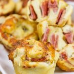 Muffin tins can be used for more than just breakfast!  These Muffin Tin Stromboli are packed with Italian meats and cheeses, and they're the perfect football appetizer!