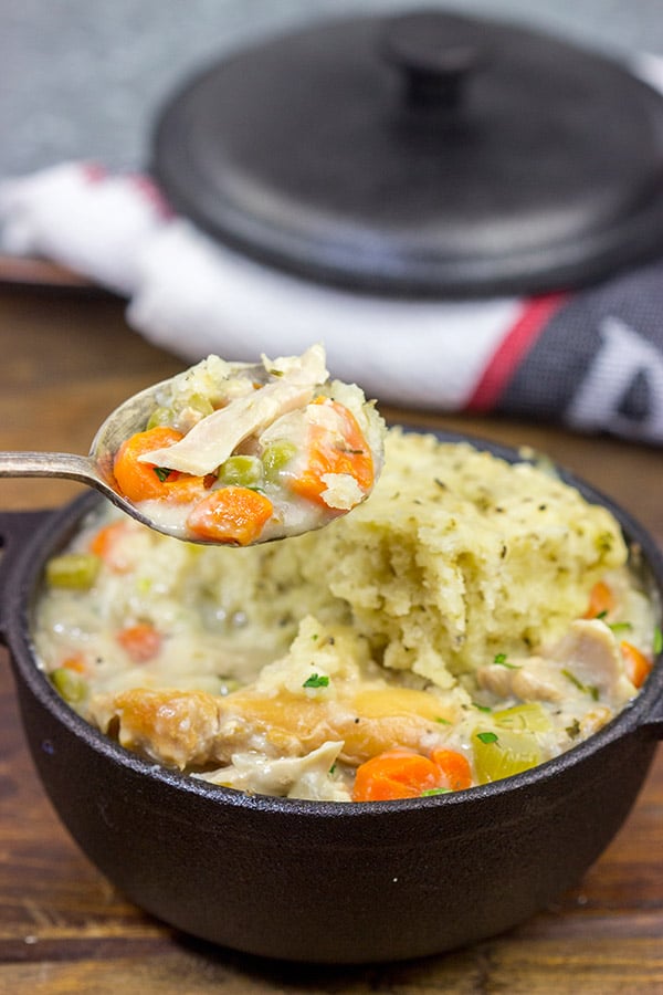 These Slow Cooker Chicken and Dumplings are the very definition of winter comfort food!  This recipe is sure to keep you warm on the cold winter nights ahead.