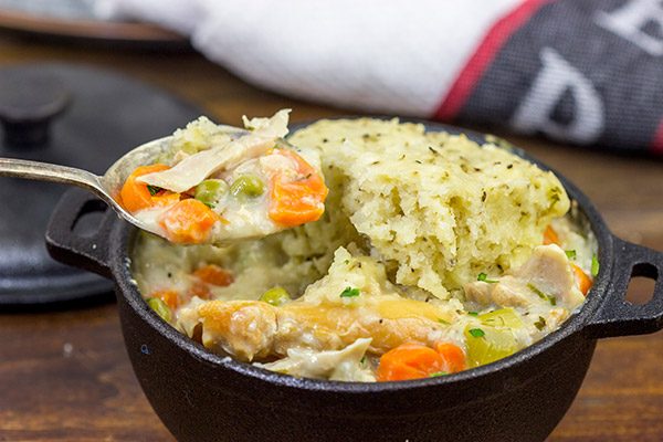 These Slow Cooker Chicken and Dumplings are the very definition of winter comfort food!  This recipe is sure to keep you warm on the cold winter nights ahead.