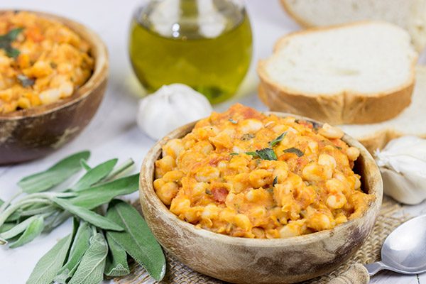 These Tuscan White Beans are a simple, yet delicious Italian recipe featuring white beans, olive oil, San Marzano tomatoes and a bit of fresh sage.  Enjoy!