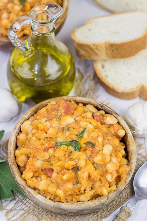 These Tuscan White Beans are a simple, yet delicious Italian recipe featuring white beans, olive oil, San Marzano tomatoes and a bit of fresh sage.  Enjoy!