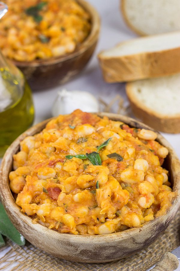 These Tuscan White Beans are a simple, yet delicious Italian recipe featuring white beans, olive oil, San Marzano tomatoes and a bit of fresh sage.  Enjoy!