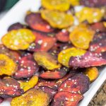 Seasoned with a bit of rosemary and salt, these Baked Beet Chips make for a fun and healthy snack!