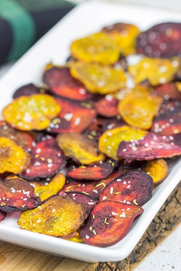 Seasoned with a bit of rosemary and salt, these Baked Beet Chips make for a fun and healthy snack!