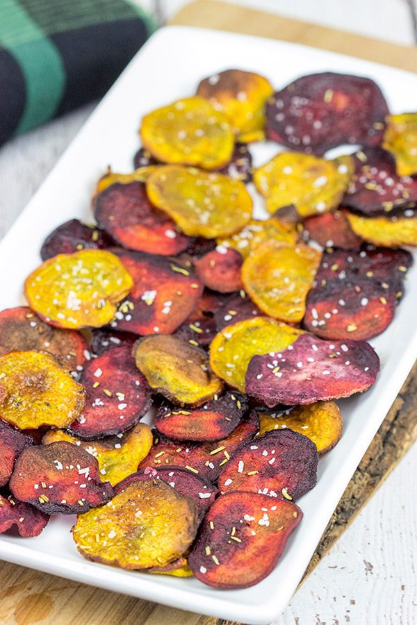 Seasoned with a bit of rosemary and salt, these Baked Beet Chips make for a fun and healthy snack!