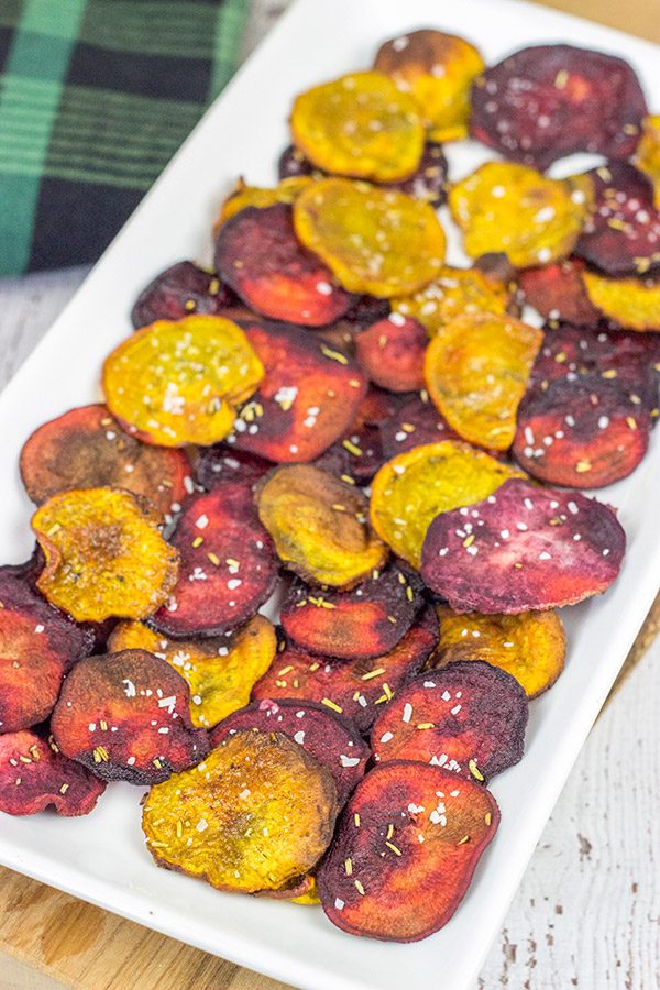 Seasoned with a bit of rosemary and salt, these Baked Beet Chips make for a fun and healthy snack!