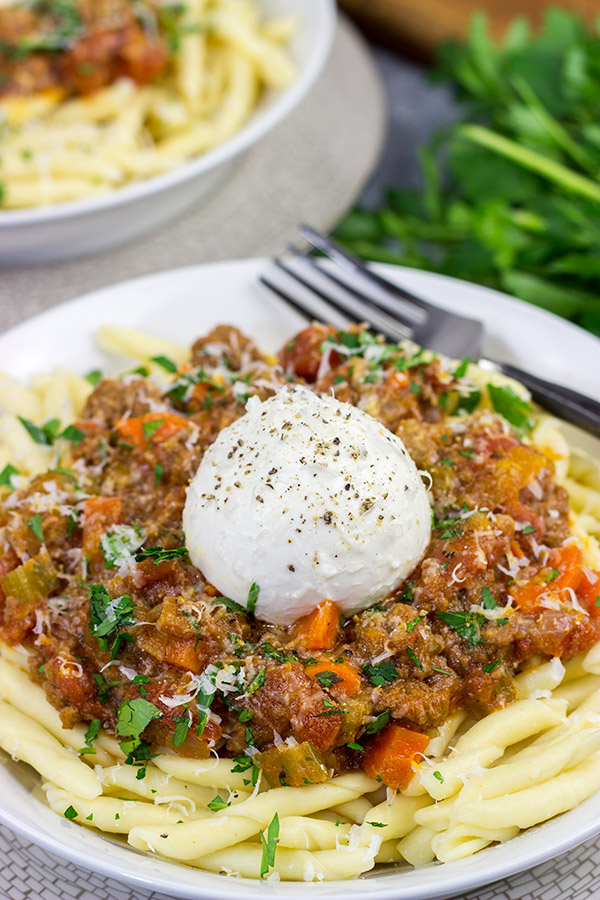 Burrata cheese on top of pasta is simply magical, and this Burrata Bolognese takes it to a whole new level of deliciousness!