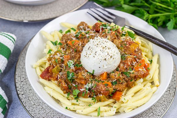 Burrata cheese on top of pasta is simply magical, and this Burrata Bolognese takes it to a whole new level of deliciousness!