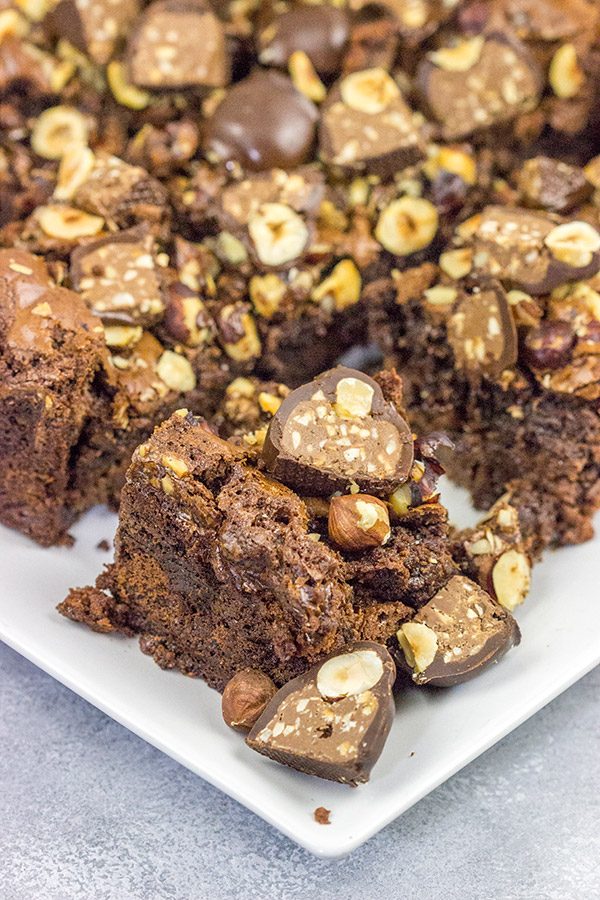 Filled with a layer of hazelnut cheesecake and topped with chopped Baci, these Chocolate Hazelnut Cheesecake Brownies are a great way to celebrate National Chocolate Day!