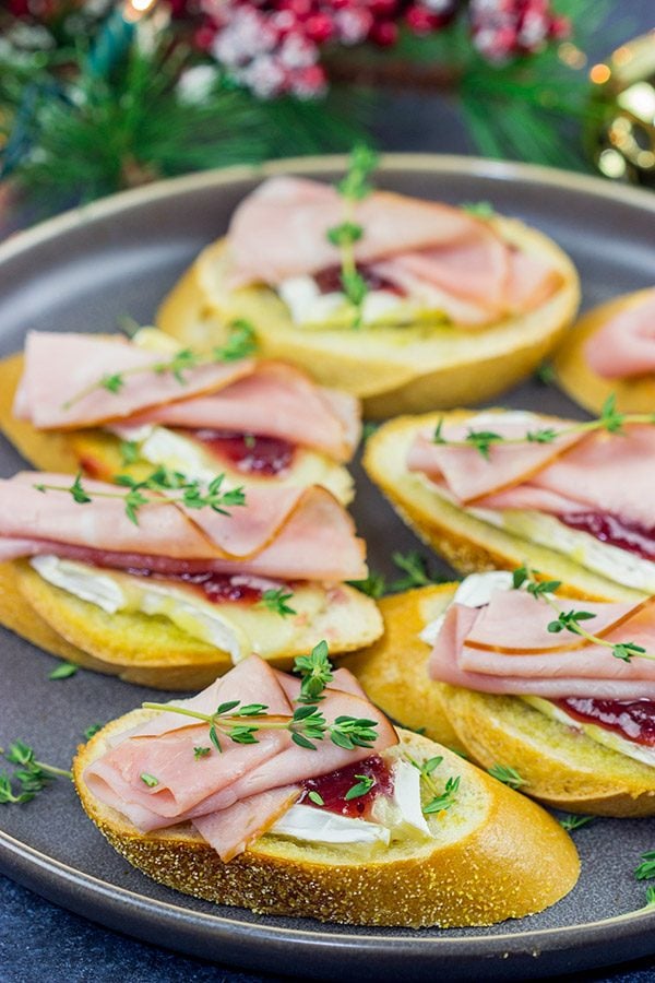 Looking for a fun way to elevate your holiday appetizers? These Ham, Brie and Cranberry Crostini are layered with tasty flavors, and they're a cinch to make!