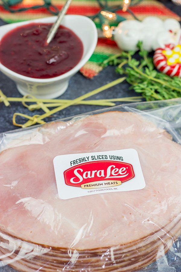 Looking for a fun way to elevate your holiday appetizers?  These Ham, Brie and Cranberry Crostini are layered with tasty flavors, and they're a cinch to make!