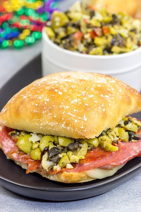These Muffaletta Panini are a twist on the classic New Orleans' sandwich, and they're the perfect way to celebrate Mardi Gras!