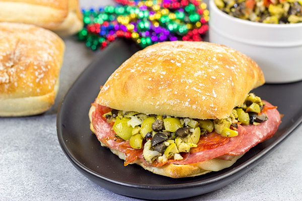 These Muffaletta Panini are a twist on the classic New Orleans' sandwich, and they're the perfect way to celebrate Mardi Gras!
