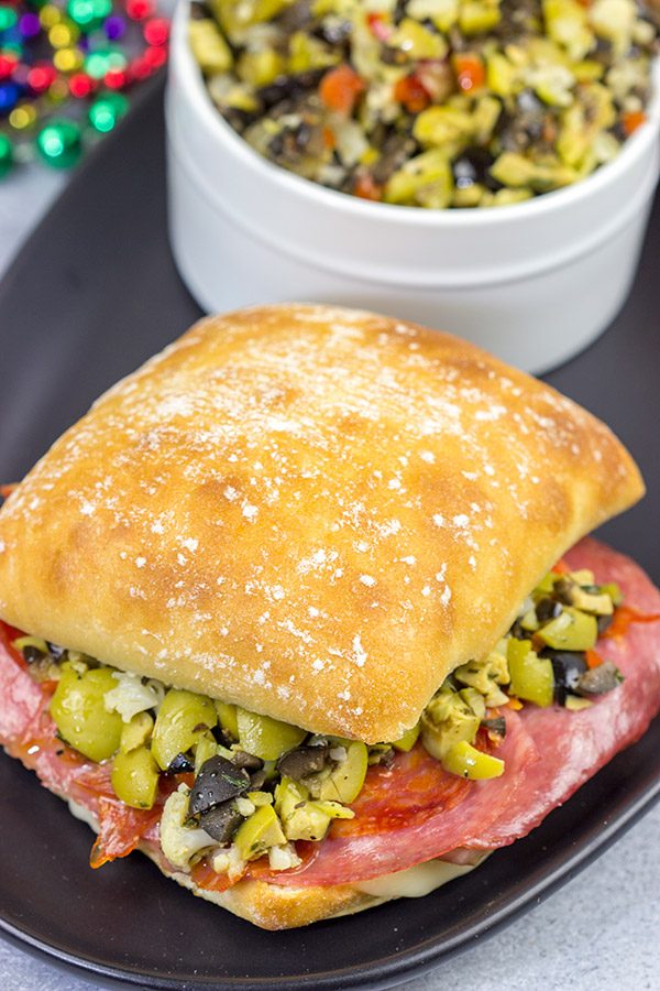 These Muffaletta Panini are a twist on the classic New Orleans' sandwich, and they're the perfect way to celebrate Mardi Gras!