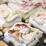 These PB&J Cheesecake Bars are an easy and delicious way to celebrate National Peanut Butter and Jelly Day!  (They're also a great dessert for any other day of the year, too!)