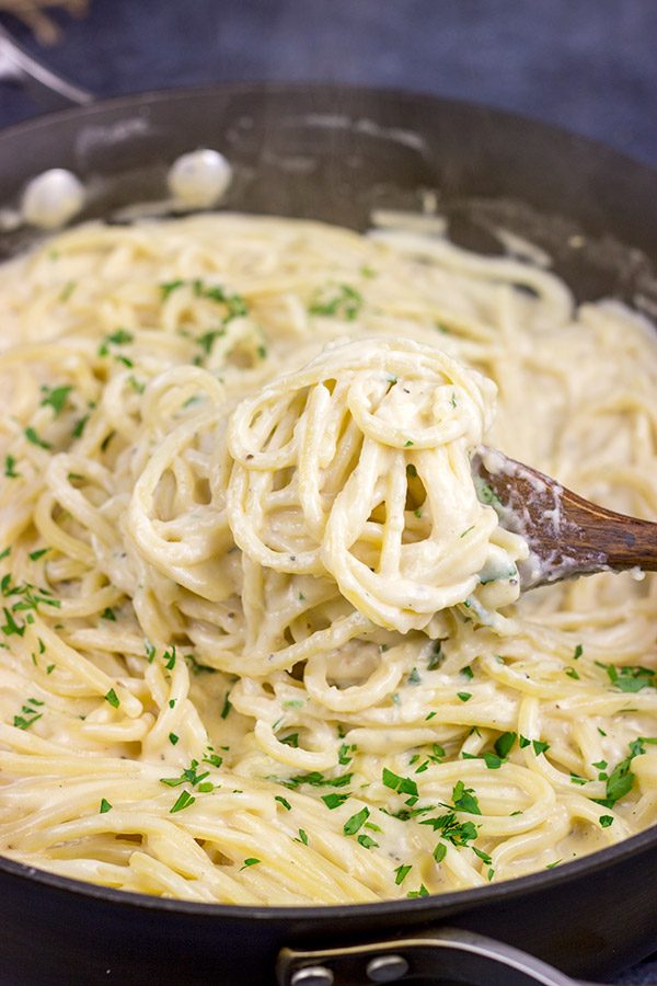 This Garlic Parmesan Sauce is not only creamy and delicious, but it's ready in about the same time it takes to cook pasta. Coincidence? I think not!
