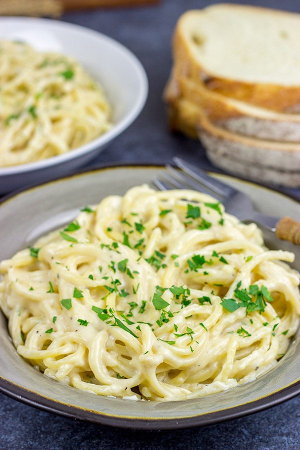 This Garlic Parmesan Sauce is not only creamy and delicious, but it's ready in about the same time it takes to cook pasta. Coincidence? I think not!