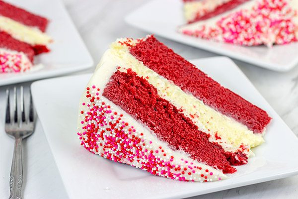 1 layer of cheesecake + 2 layers of red velvet cake = 3 layers of awesome!  This Red Velvet Cheesecake Cake is a tasty way to celebrate Valentine's Day...or any other day of the year!