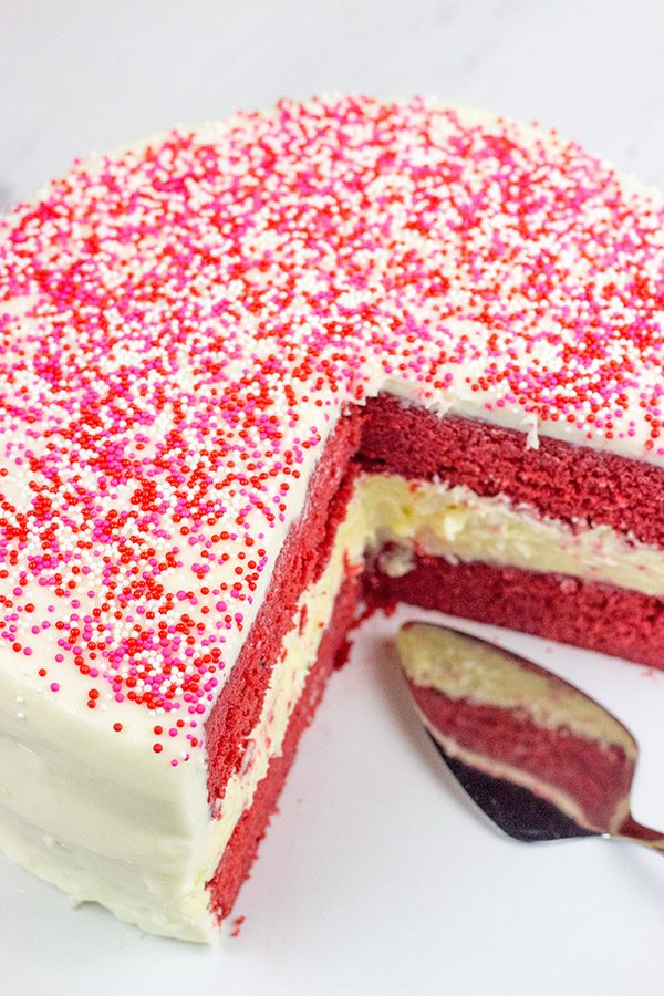 1 layer of cheesecake + 2 layers of red velvet cake = 3 layers of awesome!  This Red Velvet Cheesecake Cake is a tasty way to celebrate Valentine's Day...or any other day of the year!