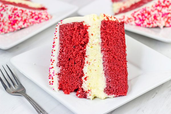 1 layer of cheesecake + 2 layers of red velvet cake = 3 layers of awesome!  This Red Velvet Cheesecake Cake is a tasty way to celebrate Valentine's Day...or any other day of the year!