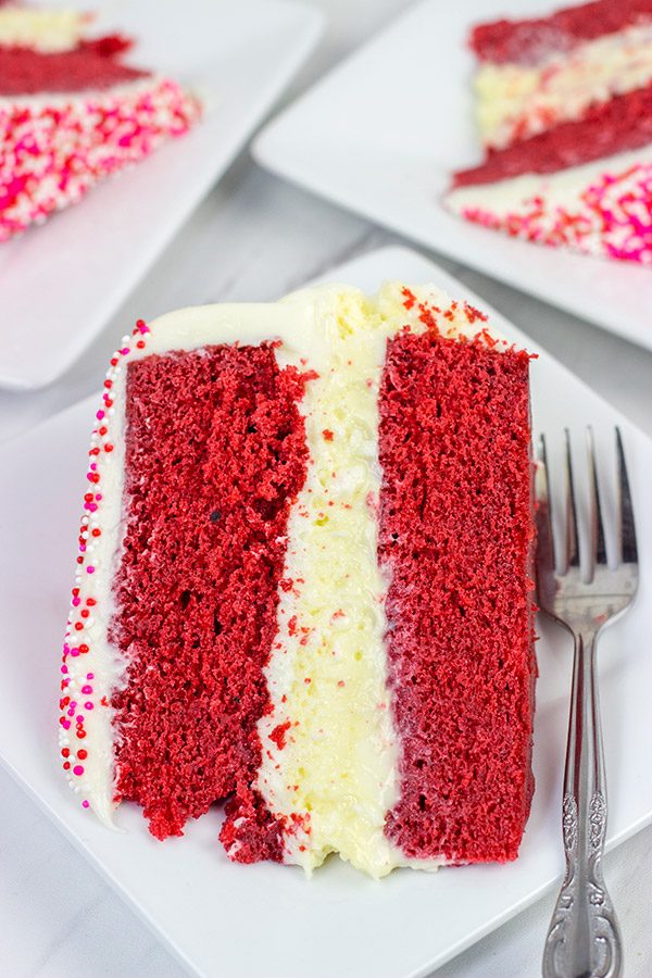 1 layer of cheesecake + 2 layers of red velvet cake = 3 layers of awesome!  This Red Velvet Cheesecake Cake is a tasty way to celebrate Valentine's Day...or any other day of the year!