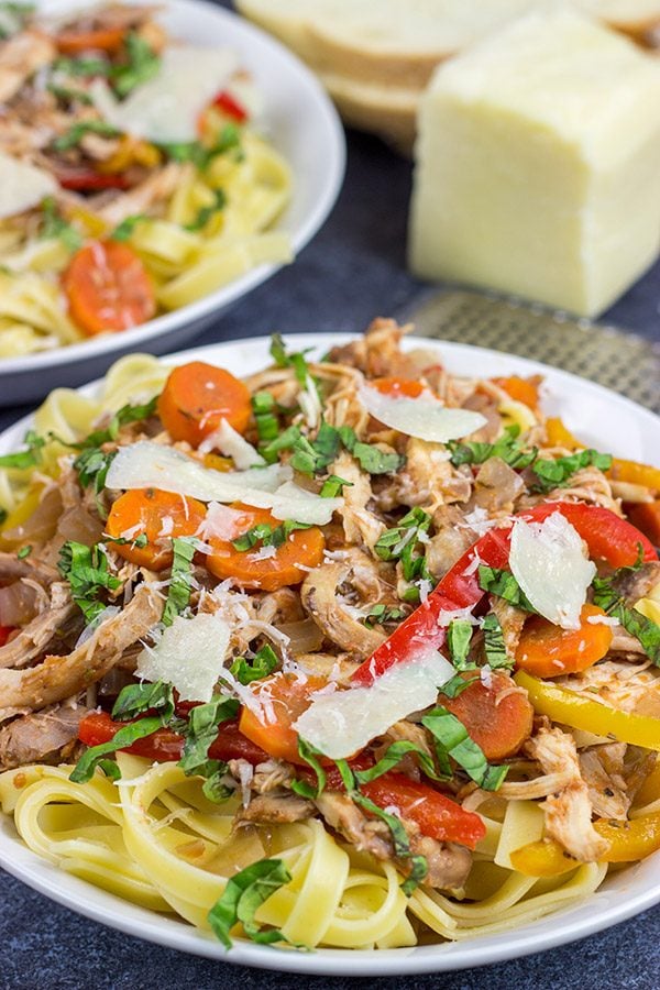Rustic Italian food just tastes better when it's cold outside!  This Slow Cooker Chicken Cacciatore is one of our favorite dinners on a chilly winter day!