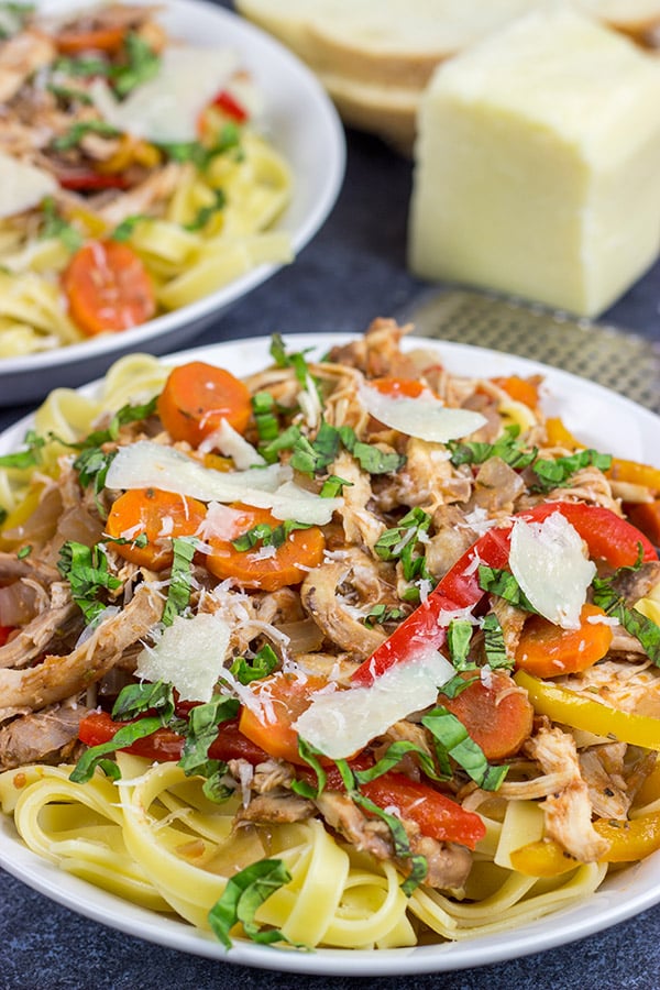 Rustic Italian food just tastes better when it's cold outside!  This Slow Cooker Chicken Cacciatore is one of our favorite dinners on a chilly winter day!
