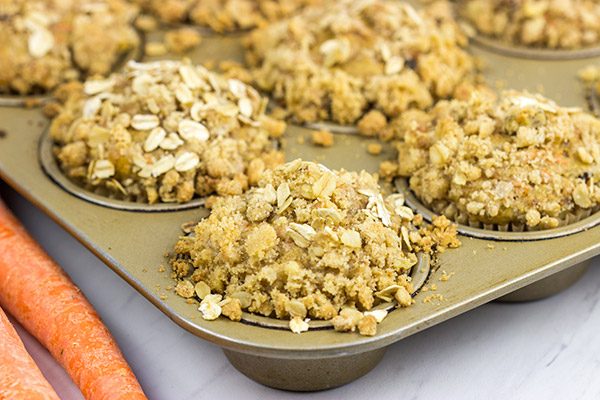 Topped with a brown sugar and walnut streusel, these Carrot Cake Muffins are a delicious way to start a weekend morning!