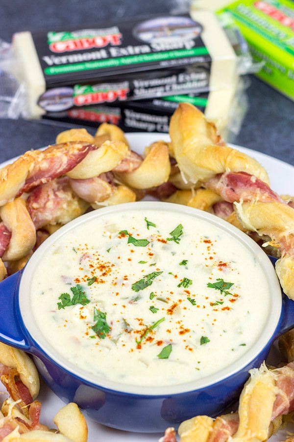 Bacon.  Cheese.  Breadsticks.  What else do you need?  These Bacon Wrapped Breadsticks with Queso are a unique and delicious football party appetizer!