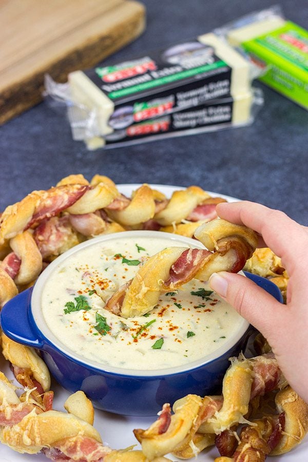 Bacon.  Cheese.  Breadsticks.  What else do you need?  These Bacon Wrapped Breadsticks with Queso are a unique and delicious football party appetizer!