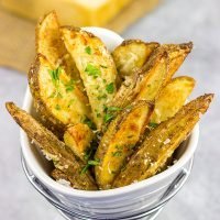 These Garlic Parmesan Baked Potato Wedges are an easy side dish that pairs well with all sorts of other dinner recipes!