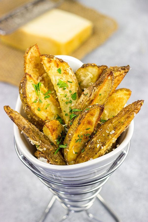 These Garlic Parmesan Baked Potato Wedges are an easy side dish that pairs well with all sorts of other dinner recipes!