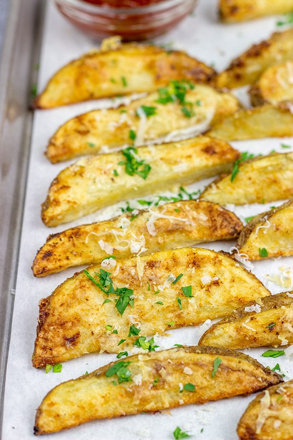 These Garlic Parmesan Baked Potato Wedges are an easy side dish that pairs well with all sorts of other dinner recipes!