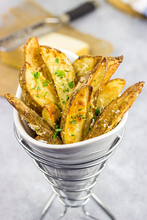 These Garlic Parmesan Baked Potato Wedges are an easy side dish that pairs well with all sorts of other dinner recipes!