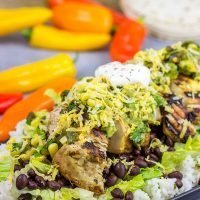 Looking for a delicious and fun recipe to grill this weekend? Put these Grilled Jerk Chicken Burrito Bowls on the menu!