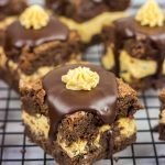 Looking for a dessert that's sure to impress your friends and family?  These Peanut Butter Cookie Dough Stuffed Brownies are a winner!