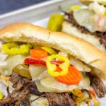 Starting with a classic chuck roast, these Slow Cooker Italian Beef Sandwiches make for an easy and delicious comfort food meal!