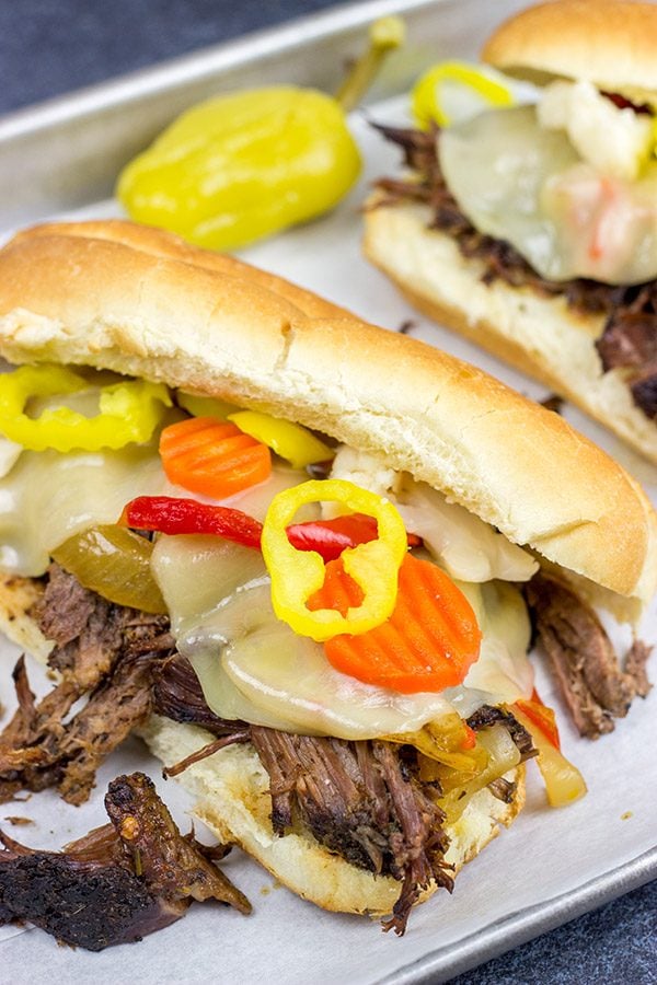 Starting with a classic chuck roast, these Slow Cooker Italian Beef Sandwiches make for an easy and delicious comfort food meal!