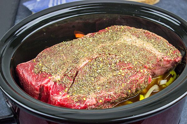 Starting with a classic chuck roast, these Slow Cooker Italian Beef Sandwiches make for an easy and delicious comfort food meal!