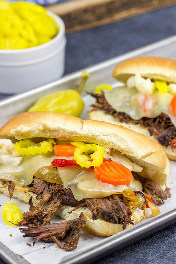 Starting with a classic chuck roast, these Slow Cooker Italian Beef Sandwiches make for an easy and delicious comfort food meal!