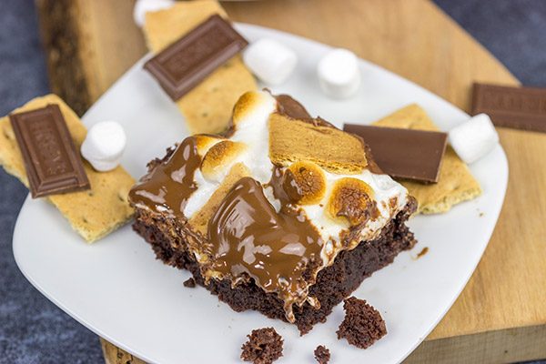 Topped with gooey marshmallows, toasted graham crackers and melted chocolate, these S'mores Brownies are sure to disappear quickly in your house!