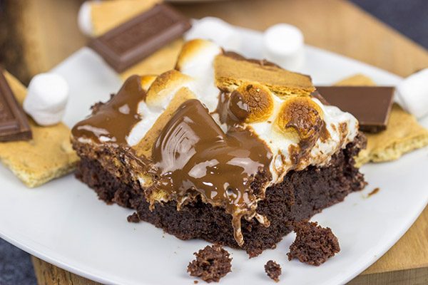 Topped with gooey marshmallows, toasted graham crackers and melted chocolate, these S'mores Brownies are sure to disappear quickly in your house!